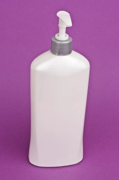 Botella de loción en blanco con bomba —  Fotos de Stock