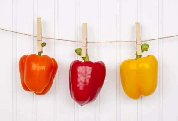Summer Peppers Hanging from a Clotheslin — Stock Photo, Image
