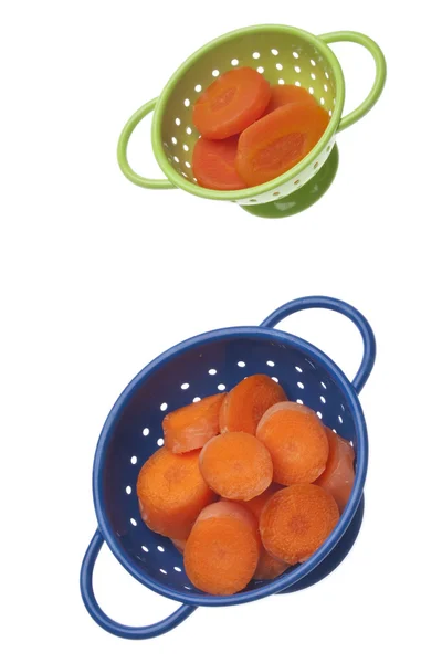Консервовані і свіжі моркви — стокове фото