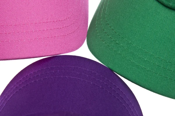Trio barevné baseballové čepice pozadí. — Stock fotografie