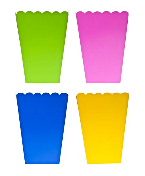 Яркие цветные коробки, наполненные попкорном — стоковое фото