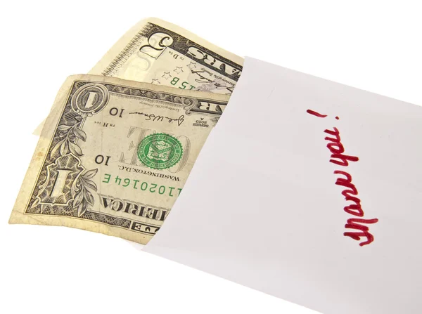 Pengar i en bank kuvert med ett handskrivet tack — Stockfoto