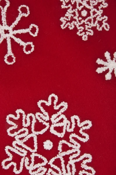 Νιφάδα χιονιού κόκκινο και λευκό φόντο — Φωτογραφία Αρχείου