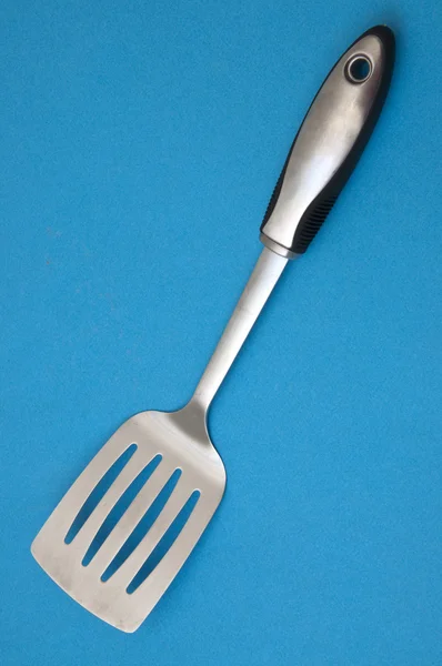 A modern kék fém spatula — Stock Fotó