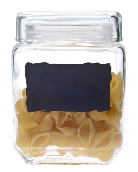 Shell formad pasta i en glasburk — Stock fotografie