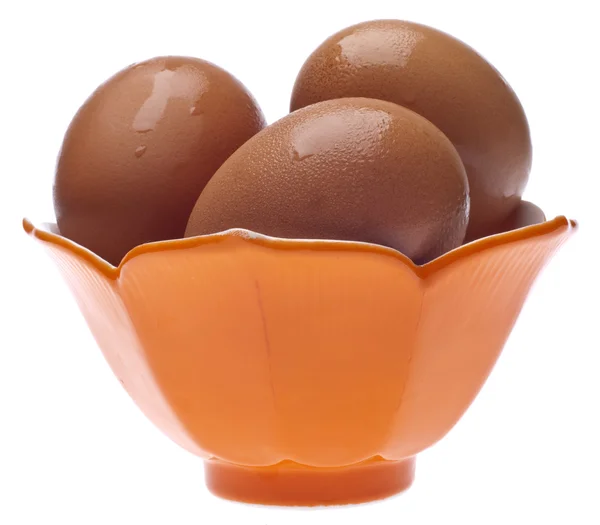 Huevos marrones en un bol — Foto de Stock