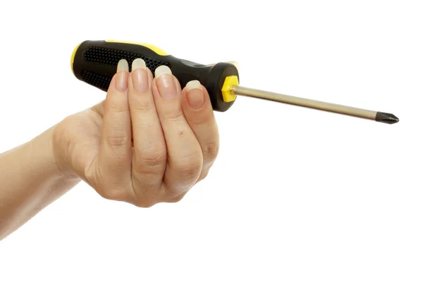 Screwdriver in a beautiful female hand — Stock Photo, Image