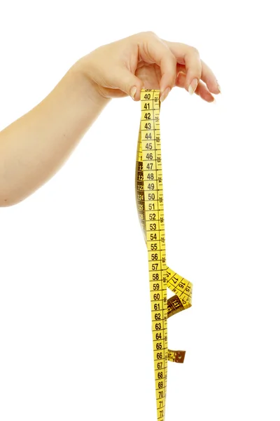 Tape measure in a beautiful female hand — Stock Photo, Image