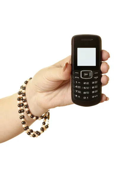 Mobile phone in the women's hand — Stock Photo, Image