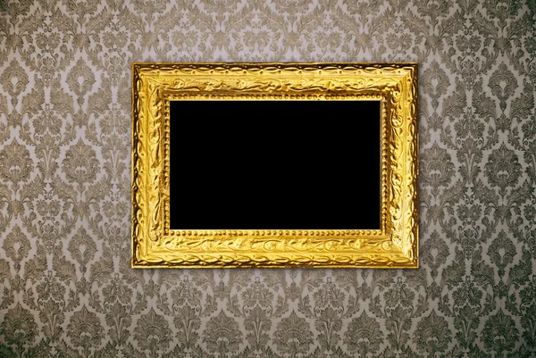 Gouden frame over vintage wallpaper — Stockfoto