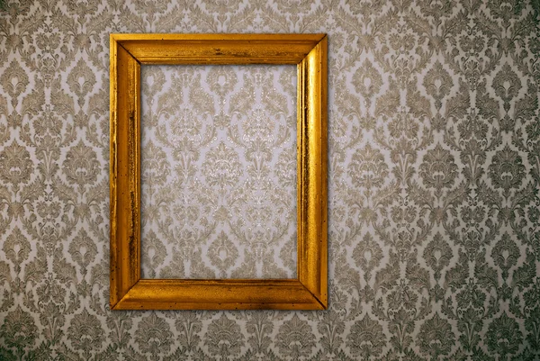 Gouden frame over vintage wallpaper — Stockfoto