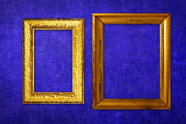 Vintage frame over blue wallpaper