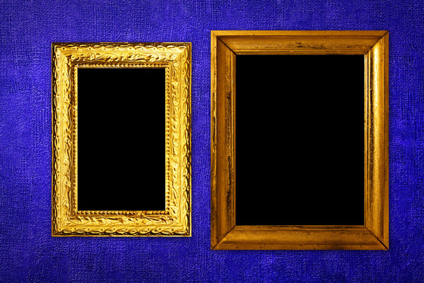 Vintage frame over blue wallpaper