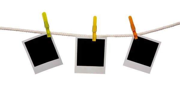 Polaroid cards on a rope — Stock Photo, Image
