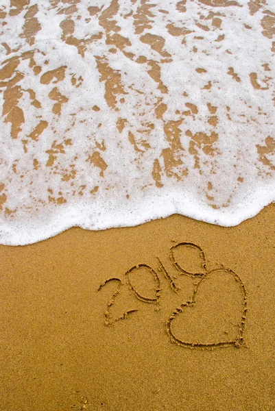 Jaar 2010 geschreven op het zand — Stockfoto