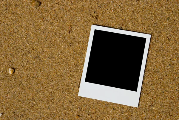 Clear photo card on a sand background — Stock Photo, Image