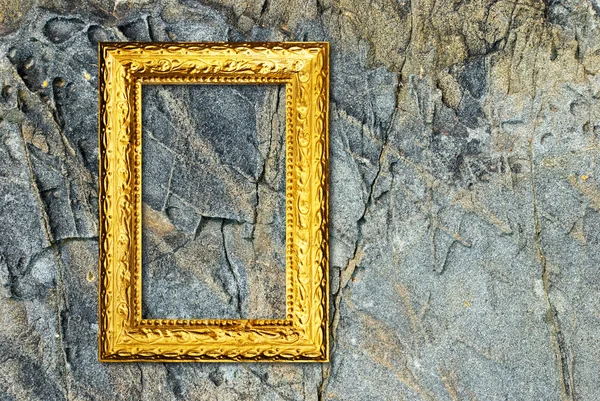 Χρυσό πλαίσιο σε πέτρινο φόντο — Φωτογραφία Αρχείου