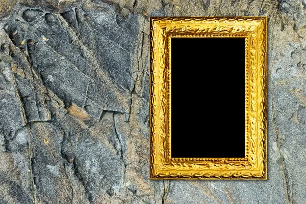 Cadre en or sur fond de pierre — Photo