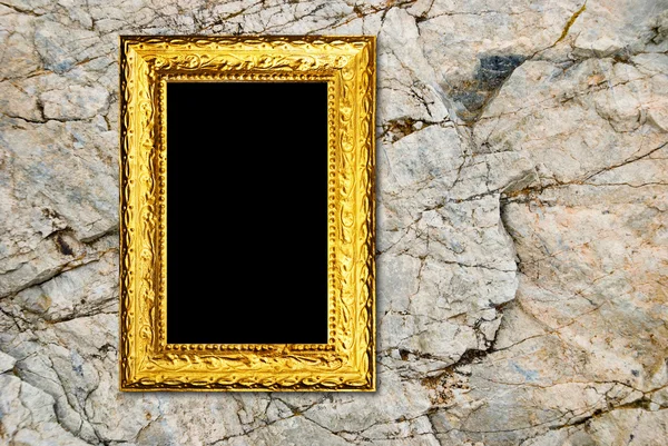 Marco de oro sobre un fondo de piedra — Foto de Stock
