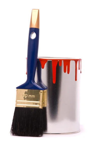 Lata de tinta vermelha e escova — Fotografia de Stock