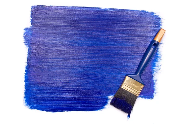Professionele borstel met blauwe verf — Stockfoto
