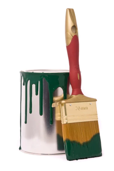 Blikje groene verf en penseel — Stockfoto