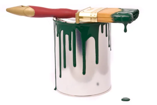 Can of green paint and brush — Stock Photo, Image