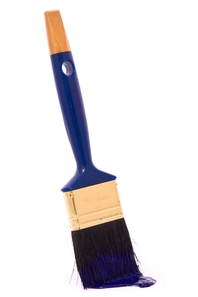 Cepillo con pintura azul sobre el blanco — Foto de Stock