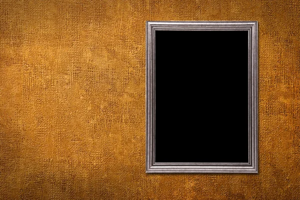 Silver ram på en gul vägg bakgrund — Stockfoto