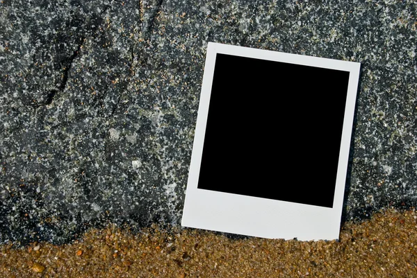 Photo frame on sand — Stock Photo, Image