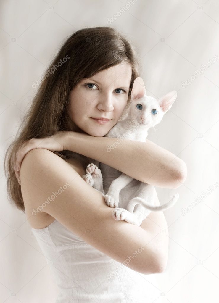 The girl with a white kitten