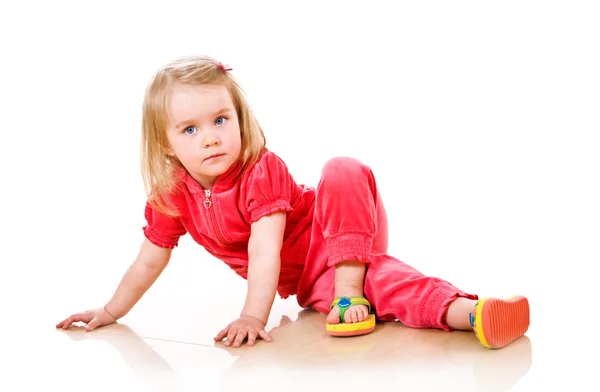 Pretty little girl makes some exercises — Stock Photo, Image