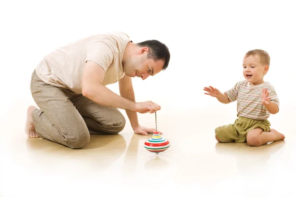 O homem brinca com o seu filho — Fotografia de Stock