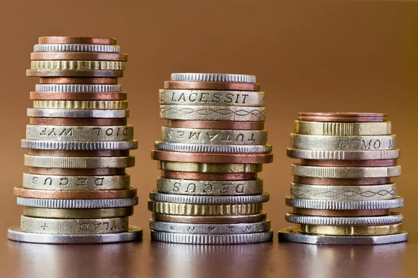 Tre mynt högar — Stockfoto