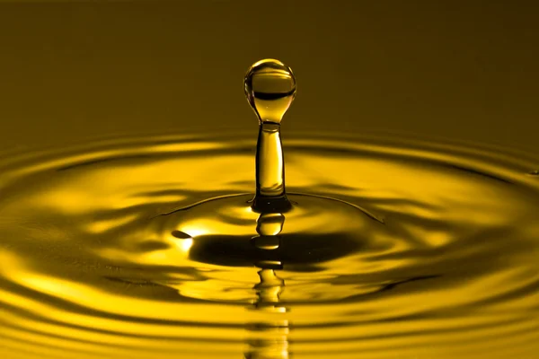Golden splash — Stock Photo, Image
