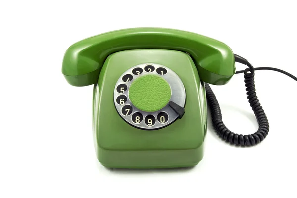 Старый зеленый аналоговый телефон — стоковое фото