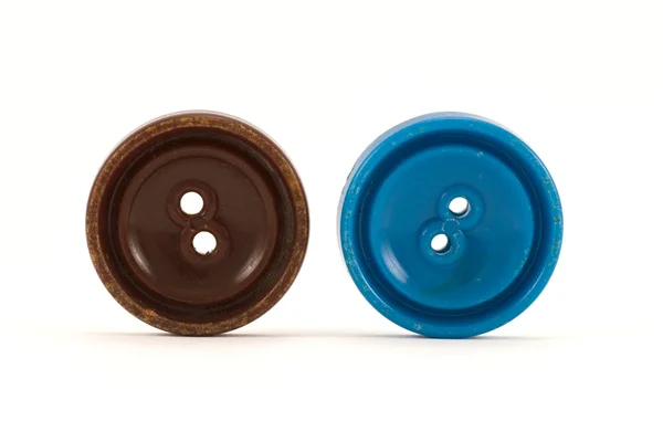Brown and blue clothes buttons — Fotografia de Stock
