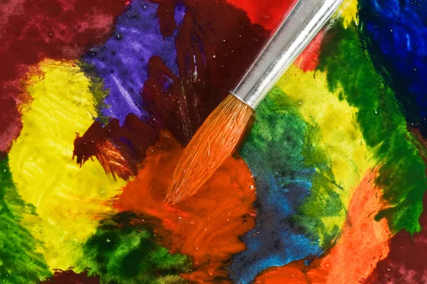 A színes festett papír ecset — Stock Fotó
