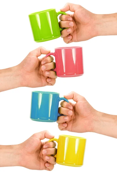 Vier handen met kleurrijke cups — Stockfoto