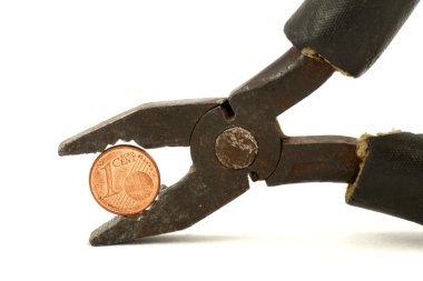 Euro cent tightly squeezed in pliers clipart