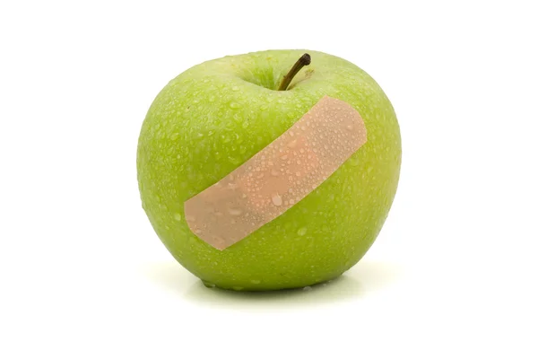 Green injured apple — Stock Photo, Image