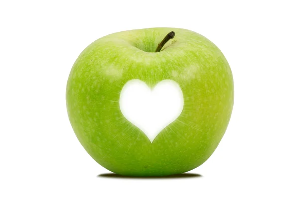 Apfel mit einem hellen Herzform — Stockfoto