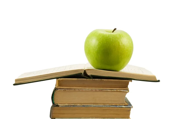 Açık kitap ile yeşil elma — Stok fotoğraf