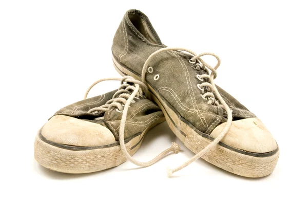 Ζεύγος των παλαιών και βρώμικα πάνινα παπούτσια — Φωτογραφία Αρχείου