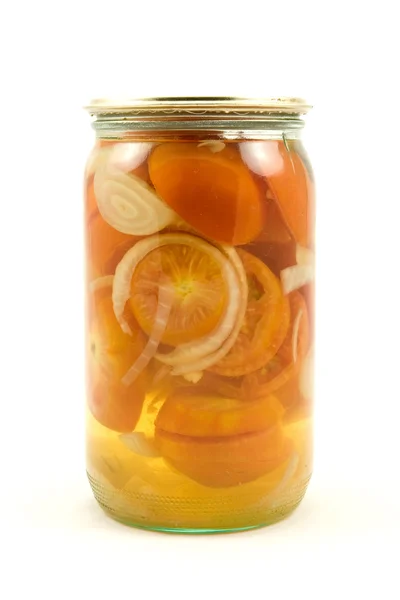 Glass jar of pickled tomatoes — Stock Photo, Image
