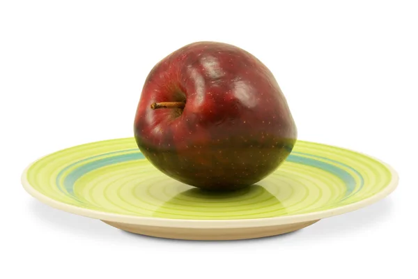 Green plate with red apple — Foto de Stock