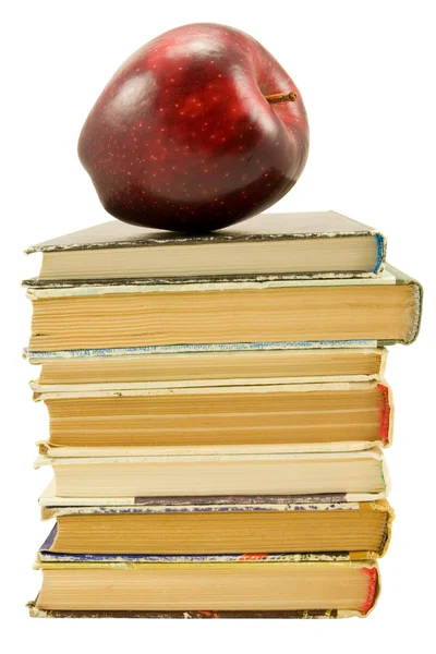Knihy s červeným jablkem — Stock fotografie