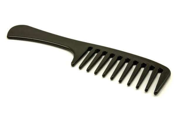 Black plastic comb — Stock Photo, Image