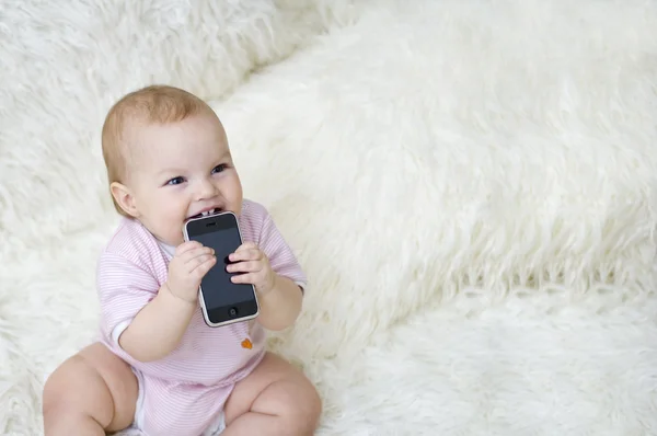 Toddler and phone — Stock Photo, Image