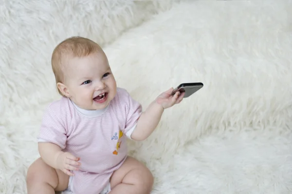 Малюк і телефон — стокове фото